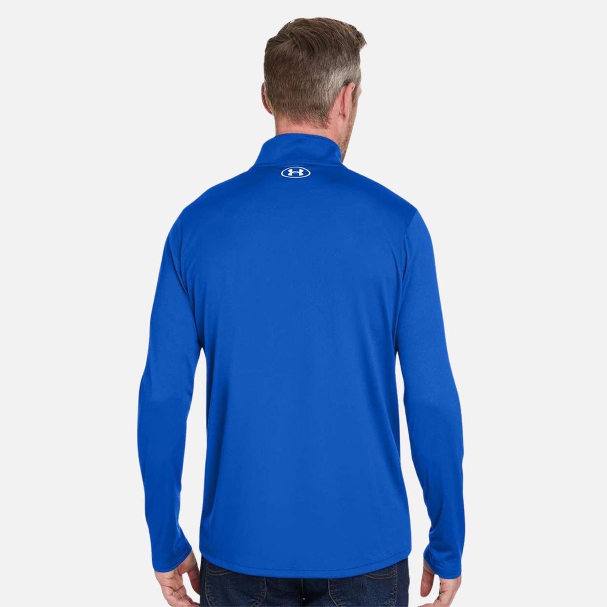 Chandail à manches longues 1/4 zip Under Armour Team Tech en tissu royal pour homme, style sportif et confortable.