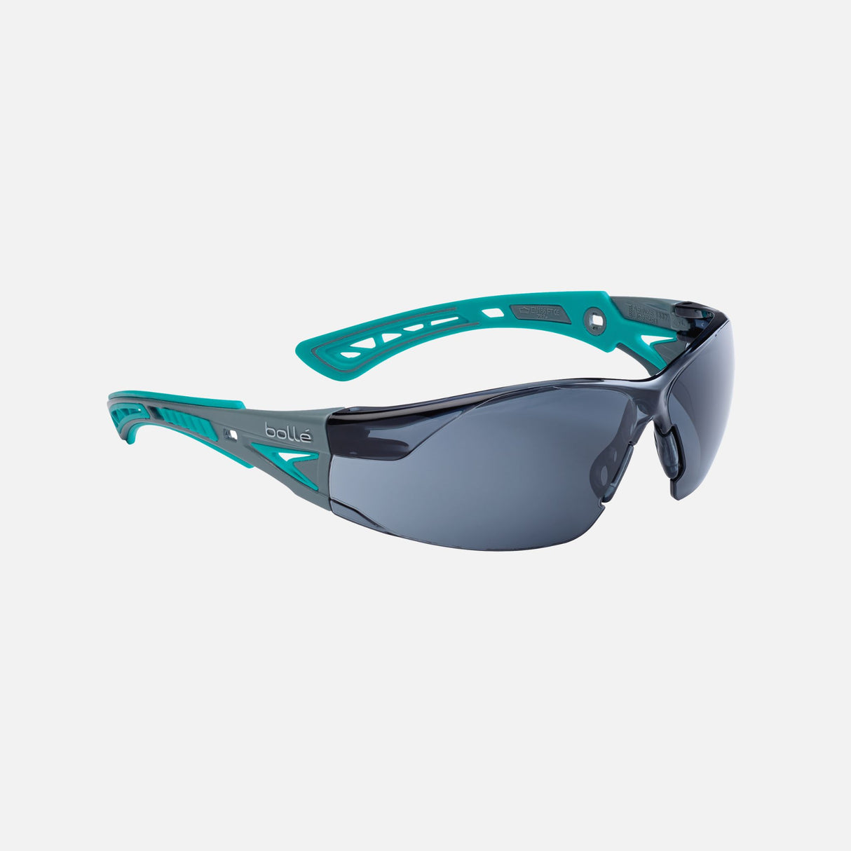Lunettes de sécurité compactes Bollé avec lentille fumée anti-buée, protection individuelle pour tâches professionnelles.