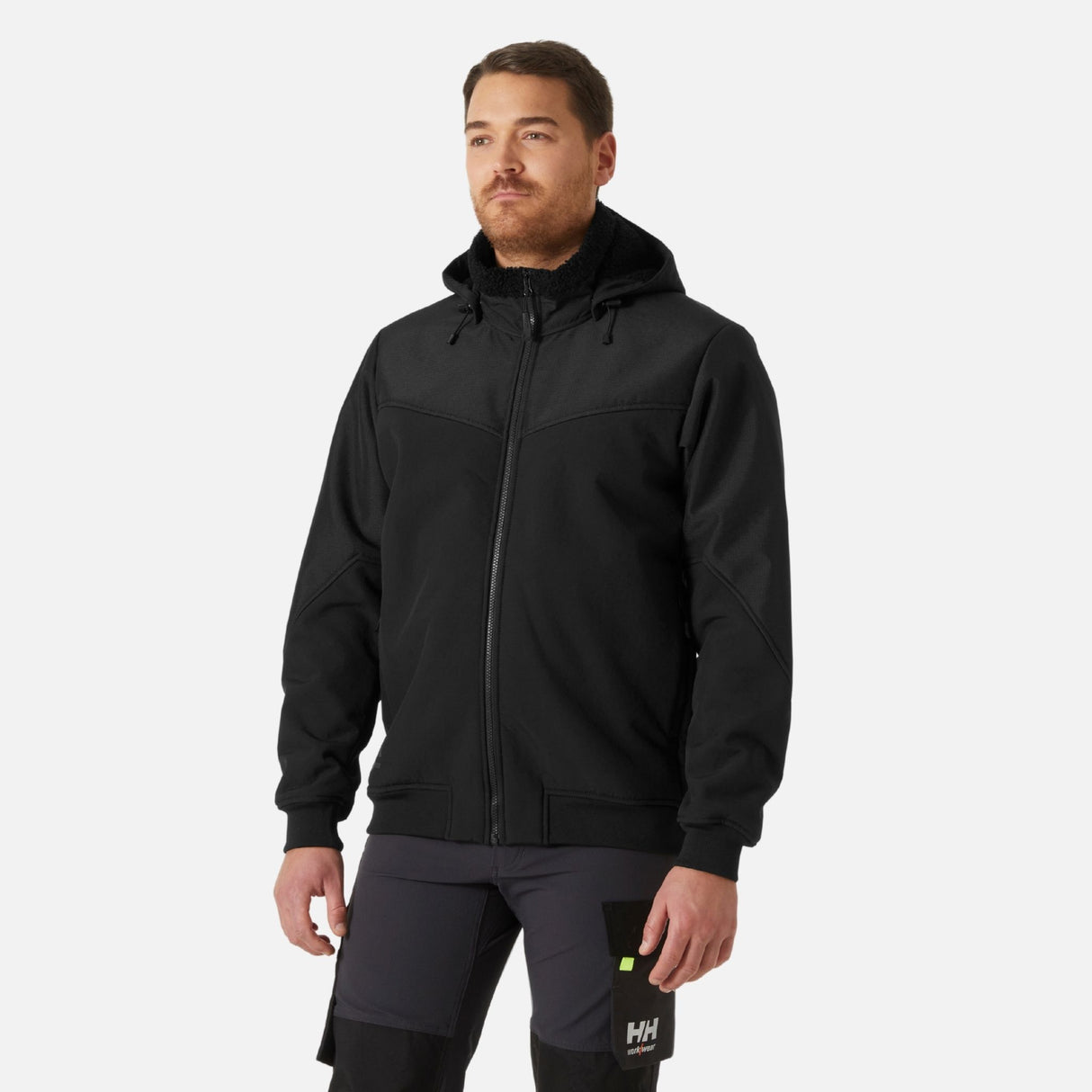 Manteau d'hiver softshell Helly Hansen pour le travail, noir, léger et chaud, idéal pour l'extérieur en hiver.