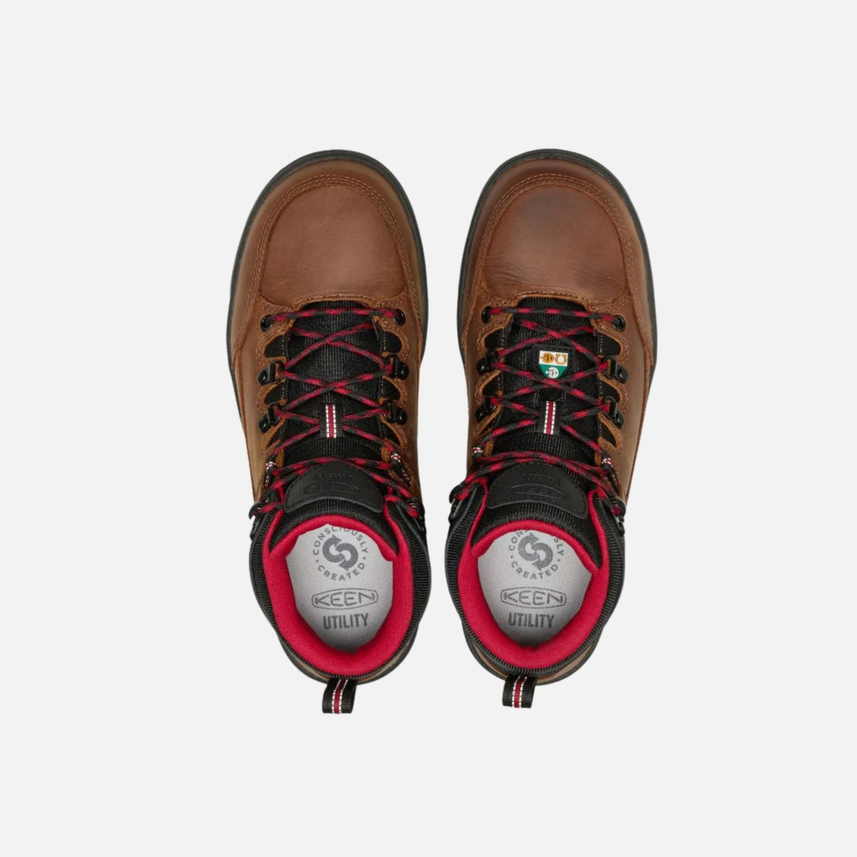 Bottes de travail Keen style randonnée, imperméables et protectrices, en brun, avec semelle robuste et design durable.