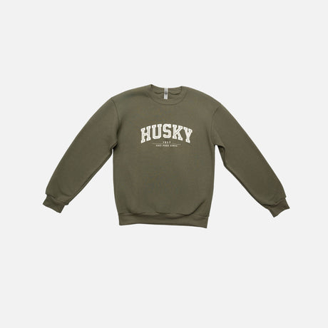 Chandail à col rond HUSKY de la collection L'Essentiel, vêtement chaud en laine bleu avec détail discret.