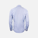 Chemise à manches longues James Harvest pour homme, tissu bleu élégant, détail de col et boutons visibles.