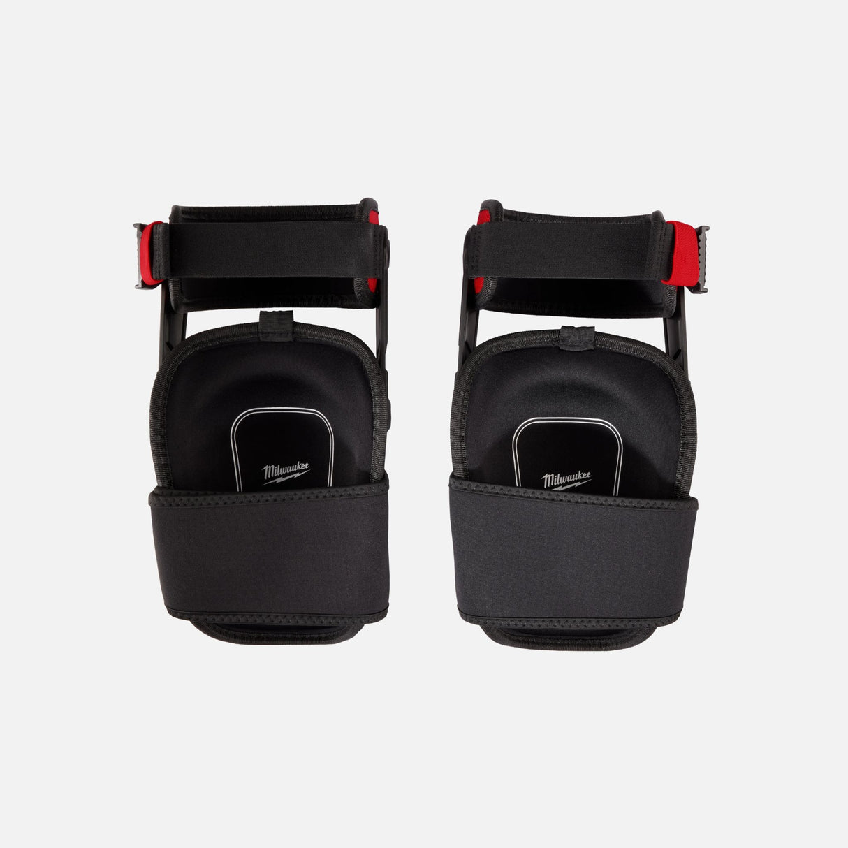 Genouillères stabilisatrices noires Milwaukee avec sangle de cuisse, accessoires de protection individuelle pour le travail.