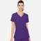 Haut d’uniforme MedCouture avec poche latérale, tissu souple et confortable, idéal pour vêtements professionnels.