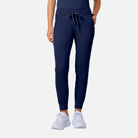 Pantalon jogger femme MedCouture marine, vêtements confort et style, tissu doux et coupe moderne, visible sur le mannequin.