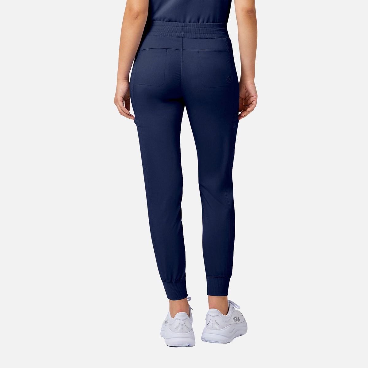 Pantalon jogger femme MedCouture en tissu marine, style décontracté et confortable, parfait pour le sport ou la détente.
