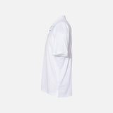 Polo à manches courtes Performance Adidas blanc pour homme, vêtement de sport en tissu léger.
