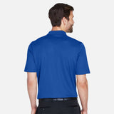 Polo Devon & Jones CrownLux DG20 en bleu royal, vêtement polo pour homme avec col classique et logo discret.