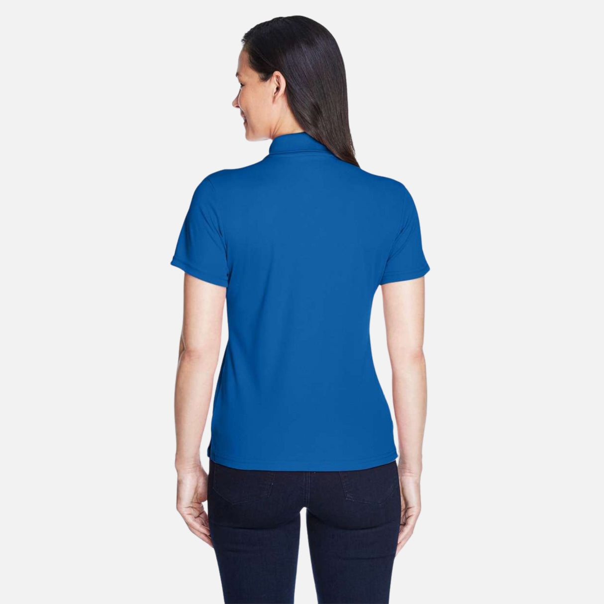 Polo pour femme Core365 Performance Origin en tissu léger de couleur bleue royal, col classique et logo sur la poitrine.