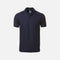 Polo à manches courtes OGIO OG101 en marine, en tissu léger, porté par un modèle sur fond blanc.