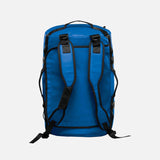 Sac 2-en-1 Stormtech, sac de voyage imperméable, duffel et sac à dos polyvalent, en tissu bleu.