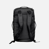 Sac 2-en-1 Stormtech noir, sac de voyage duffel et sac à dos imperméable, accessoires-sacs polyvalent pour voyager.