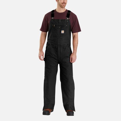 Salopette isolée Carhartt pour homme en tissu Duck lavé, chaud et robuste, vêtement de travail noir.