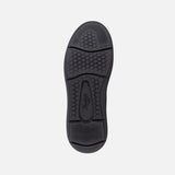 Souliers de travail Reebok sans lacets avec embout composite et semelle confortable, en noir.