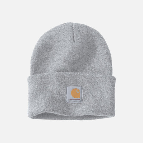 Tuque en tricot gris de style classique avec rebord de la marque Carhartt, idéale pour rester chaud en hiver.
