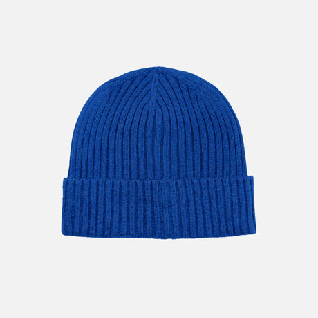 Tuque côtelé à revers DML Creation en maille douce de couleur bleu royal, portée avec le revers visible.