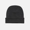 Tuque gaufrée avec revers de DML Creation, en laine douce couleur charbon, montrant la texture gaufrée et le revers côtelé.