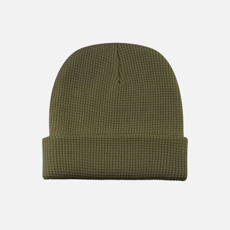 Tuque gaufrée avec revers verte de DML Creation, vêtement chaud et élégant pour l'hiver, en matière douce et texturée.