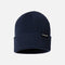 Tuque Columbia City Trek marine, accessoire chaud et stylé pour l'hiver, en laine avec logo Columbia visible.